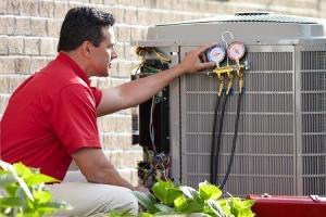 AC contractor installing a new AC system