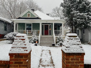 home in winter with snow