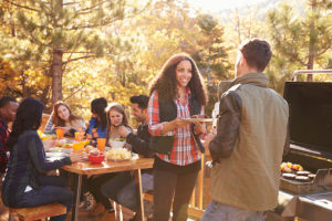 group of people enjoying a cookout