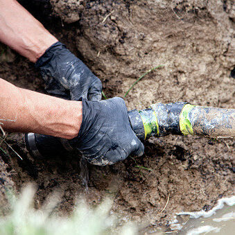 boelcke plumber reparing water main